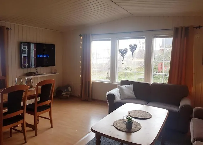 In Stunning Surroundings In Neverfjord *